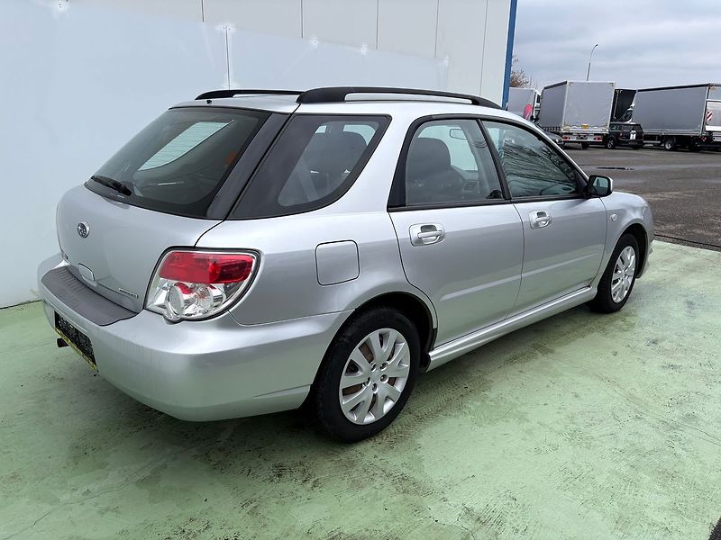 Subaru Impreza 1.5R, 77kW, 4x4, Automat - fotka 4 z 23