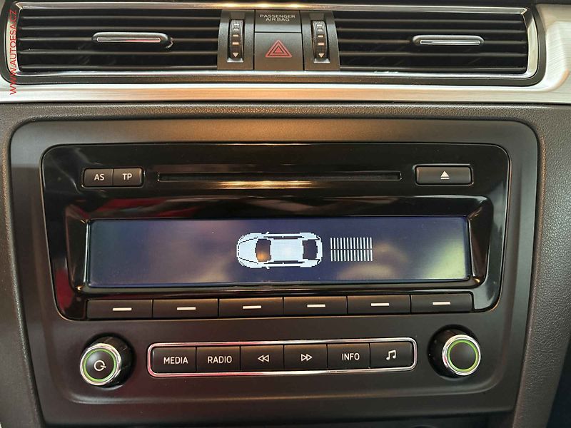 Škoda Rapid (2014) 1.2 TSi, ELE, výhř.sed. - fotka 13 z 15