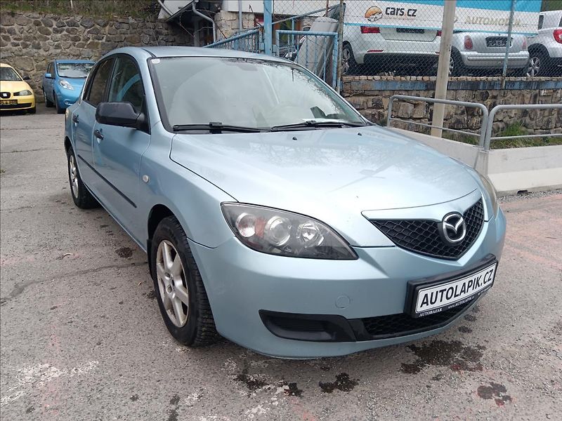 Mazda 3 1,4 i Sport CE - fotka 16 z 20