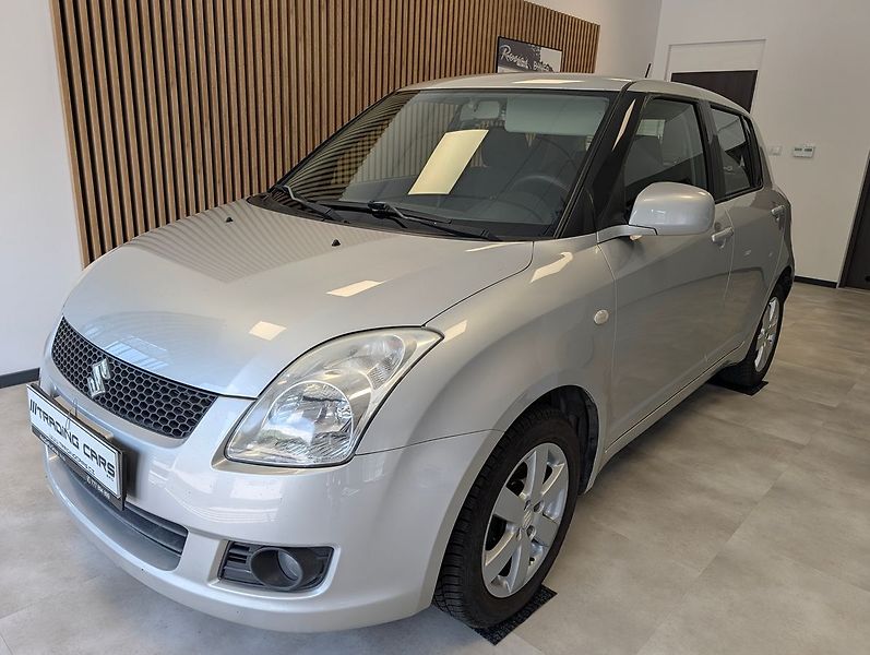 Suzuki Swift 1.3i 4x4 - fotka 2 z 24