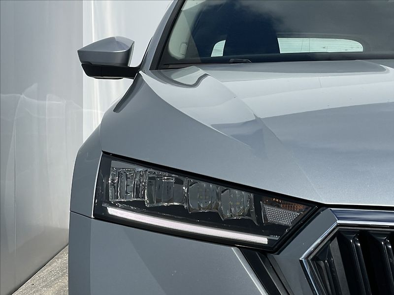Škoda Octavia 2,0 TDI Combi Ambition Plus - fotka 20 z 22