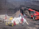 Manitou MRT 2150 při práci v povrchovém dole.