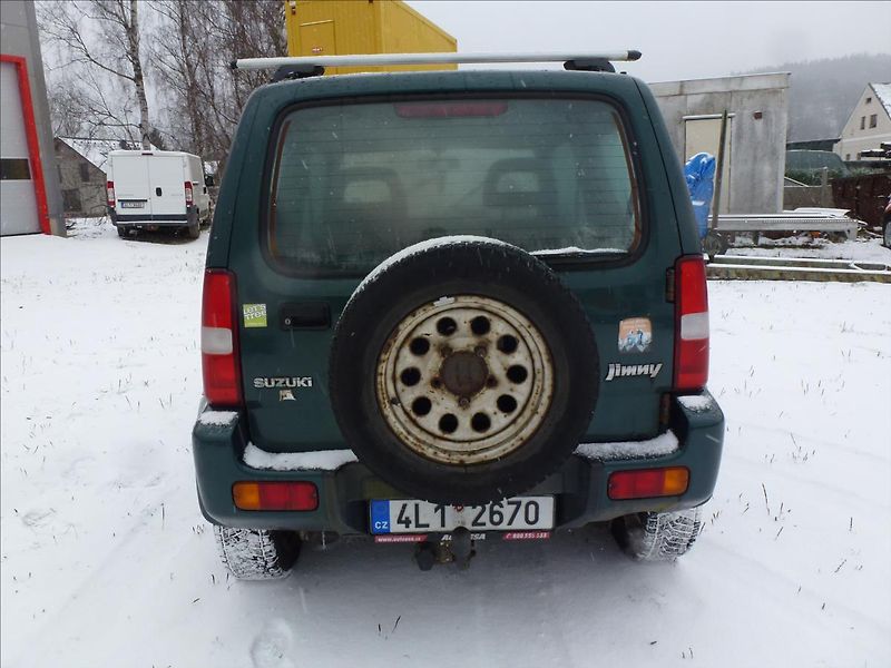 Suzuki Jimny 1,3 16v 4x4 Off Road, Na oprav - fotka 9 z 29