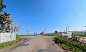 1. místo - průsečná křižovatka silnic II/418 a III/4176 u města Újezd u Brna.