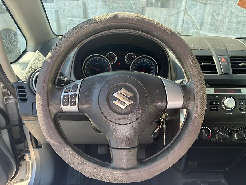 Suzuki SX4 (2011) 1.6i, 88KW, VYHŘ. SEDADLA, 4X4 - fotka 15 z 23