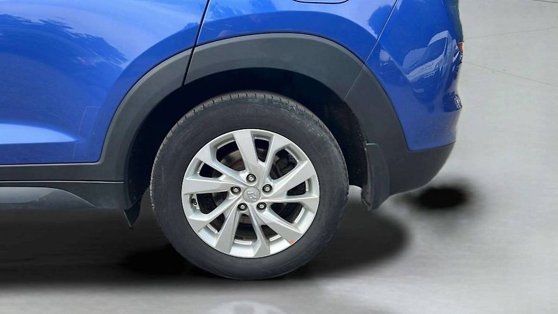 Hyundai Tucson 1,6 TGDI 130kW DCT 4WD Trikolo - fotka 38 z 40