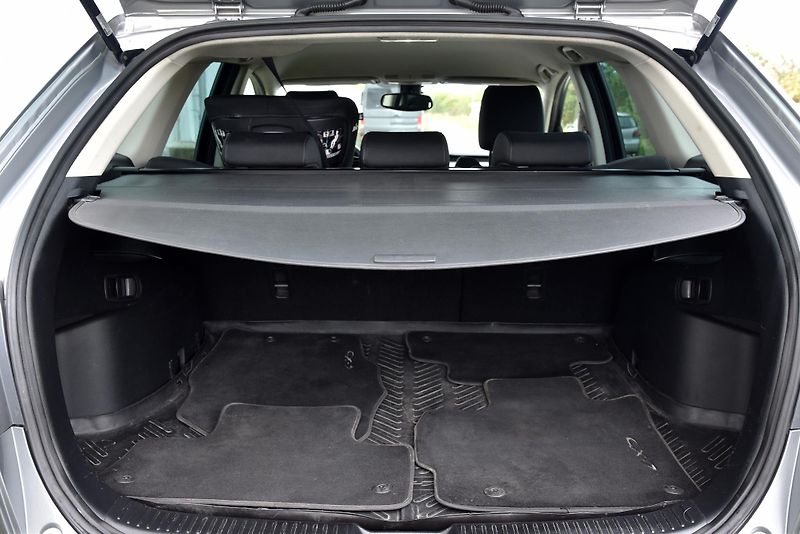 Mazda CX-7 2.2 MZR-CD 4WD,NAVI,VÝHŘEV,TZ - fotka 36 z 39