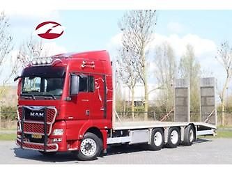 MAN TGX (2015) 33.560 8x4 transport strojů EU - fotografie inzerátu