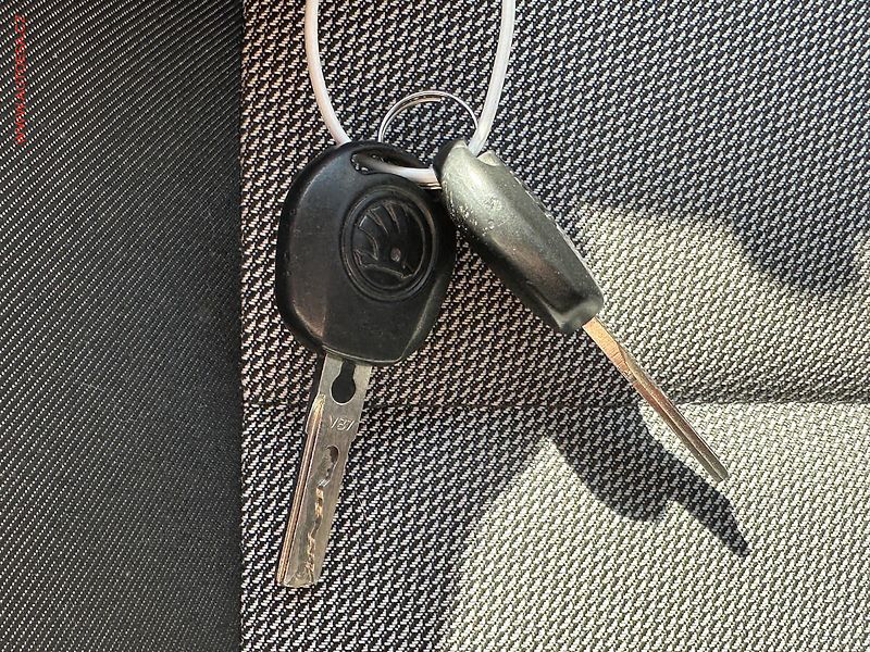 Škoda Roomster (2013) 1.2TSi, AC, STK4/28 - fotka 16 z 16