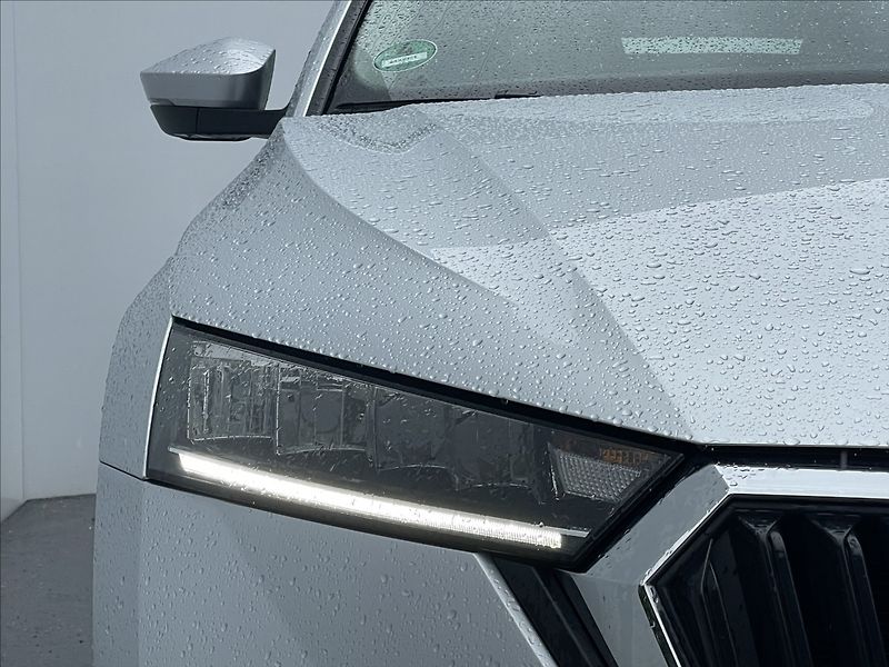 Škoda Octavia 2,0 TDI Combi Ambition Plus - fotka 21 z 23