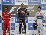 Sebastian Vettel (uprostřed) triumfoval ve Velké ceně Japonska před druhým Felipe Massou (vlevo), třetí skončil Kamui Kobajaši.