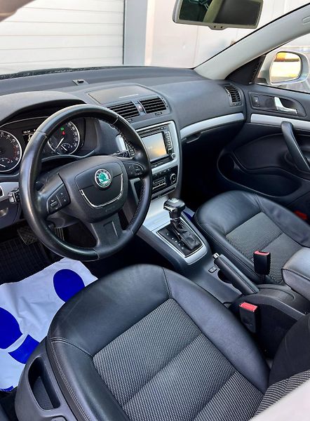Škoda Octavia (2013) FL COMBI 2.0 TDI DSG 103 KW  - fotka 11 z 36