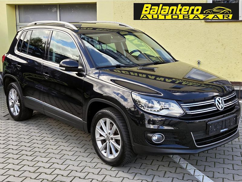 Volkswagen Tiguan 1,4TSI SPORT *SERV.KNÍŽKA*    - fotka 1 z 43