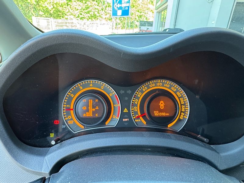 Toyota Auris (2009) 1.4 16V Klima - fotka 17 z 28