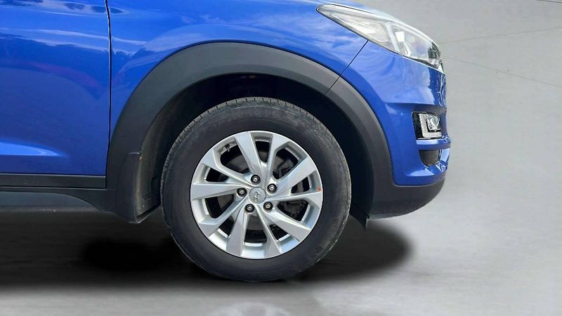 Hyundai Tucson 1,6 TGDI 130kW DCT 4WD Trikolo - fotka 35 z 40
