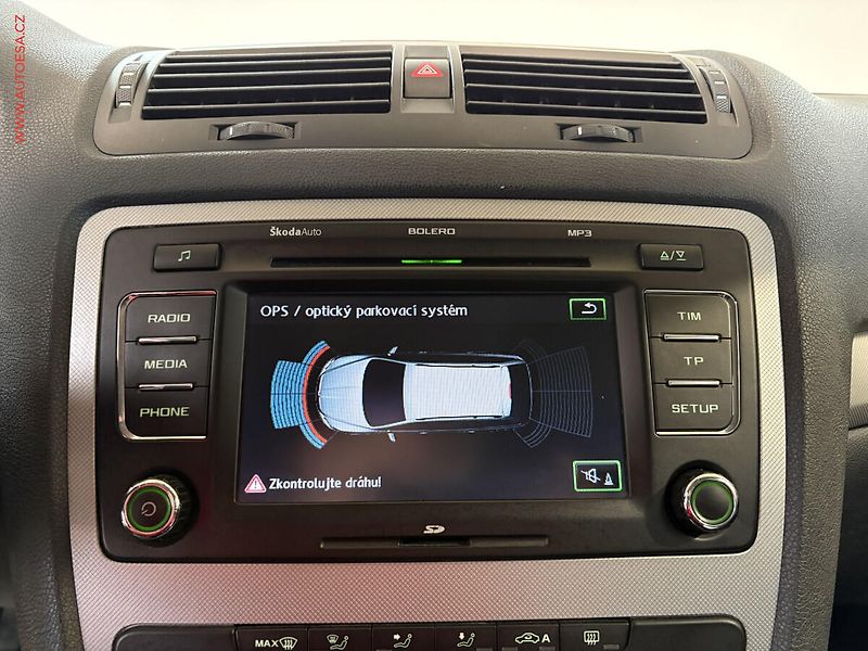 Škoda Octavia (2013) 1.6TDi 4x4, AC, park.čidla - fotka 13 z 14