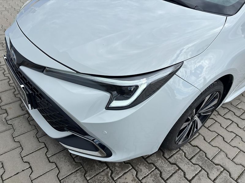 Toyota Corolla 1.8 HSD e-CVT Style Tech - fotka 26 z 28