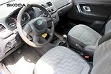 Škoda Roomster (2009) 1.4 16V 63 kW Style - náhled 11