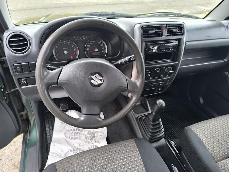 Suzuki Jimny (2011) 1.3 4x4 DOLOŽENÉ KM,SERVISNÍ K - fotka 16 z 29