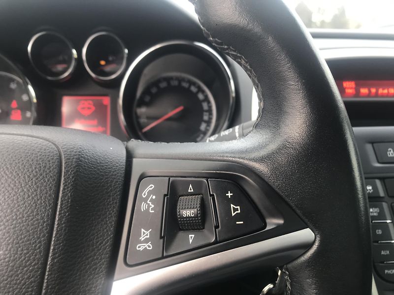 Opel Astra 1.4i 74 KW,KLIMA ,TEMPOMAT.... - fotka 13 z 17