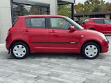 Suzuki Swift (2009) 1,3 i 66 Kw 4x4 - náhled 3