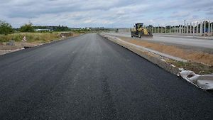 Pokládka cementobetonového a asfaltového povrchu vozovky na stavbě dálnice D1 mezi Říkovicemi a Přerovem, 28. června 2025