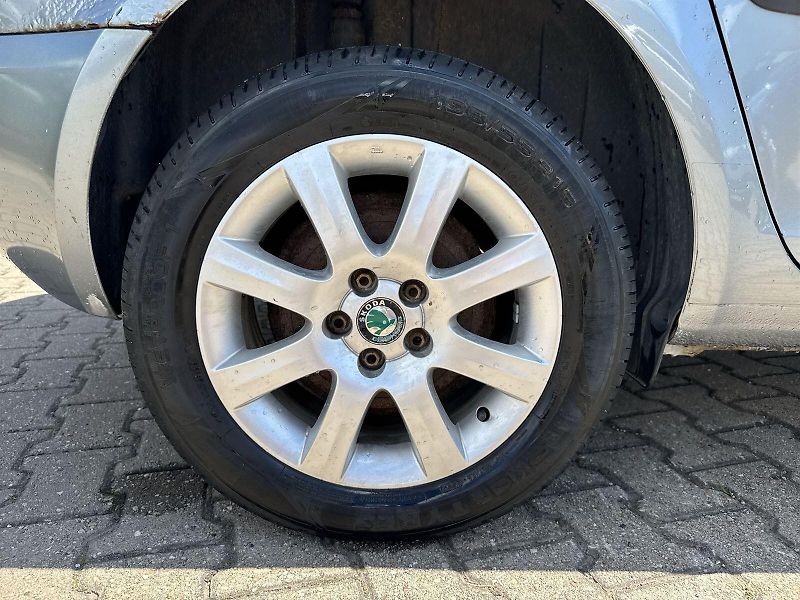 Škoda Roomster (2011) 1.2 TSI Ambition - fotka 20 z 24