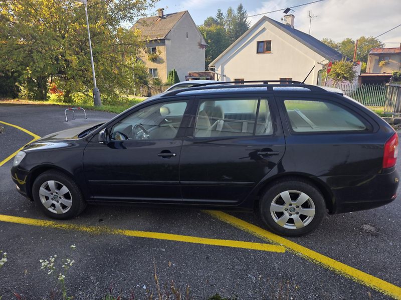 Škoda Octavia (2011) 2 face 2.0 TDi 103kw DSG - fotka 6 z 15