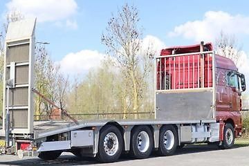 MAN TGX (2015) 33.560 8x4 transport strojů EU - fotka 13 z 21