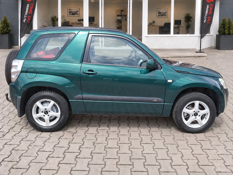 Suzuki Grand Vitara (2008) 1.6i 78kW 4x4 -T.ZAŘ-4 MÍSTNÉ - fotka 9 z 27