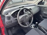Suzuki Swift (2009) 1,3 i 66 Kw 4x4 - náhled 11