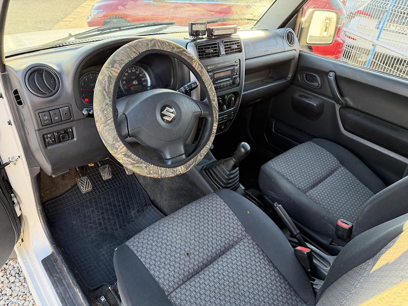 Suzuki Jimny 1,3i/63kW 4x4 - Klima,TZ,... - fotka 13 z 70