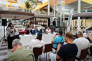 Výstava závodních aut Škoda v OC Olympia.