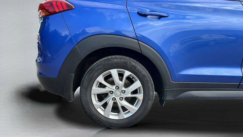 Hyundai Tucson 1,6 TGDI 130kW DCT 4WD Trikolo - fotka 36 z 40