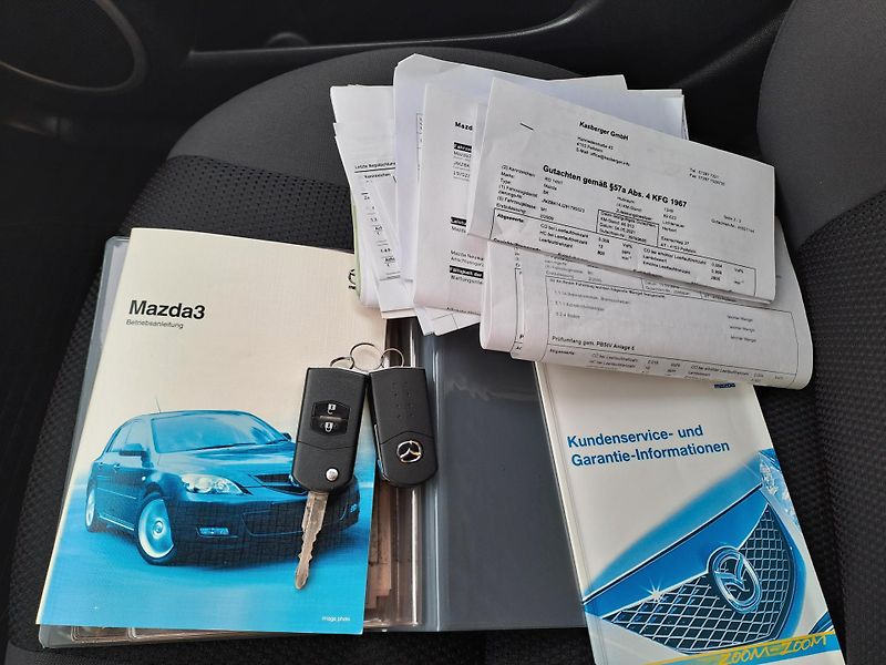 Mazda 3 (2009) 1.4i DOLOŽENÉ KM, 2 x KOLA - fotka 31 z 34