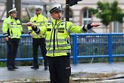 Ilustrační foto. Křižovatka řízená policistou.