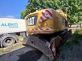 Caterpillar (2015) kolový bagr MH 3022 - náhled 3