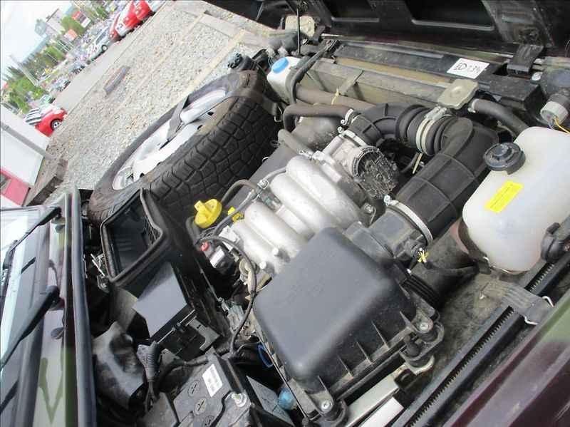Lada Niva 1,7 i, BRONTO,4x4,klima,tažné, - fotka 27 z 29