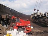 Manitou MRT 2150 při práci v povrchovém dole.