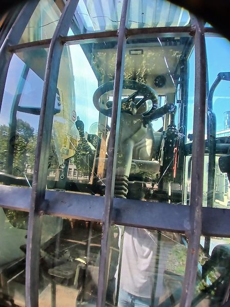 Caterpillar (2015) kolový bagr MH 3022 - fotka 13 z 23