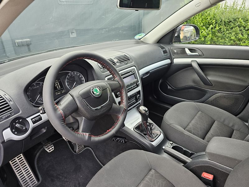 Škoda Octavia 1.2 TSI 77kW,SENZORY,VÝHŘEVY - fotka 18 z 43
