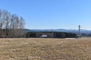 Stavba dálnice D3 nedaleko Nažidel. Úsek Nažidla - Dolní Dvořiště. Pohled od staveniště na dnešní I/3.