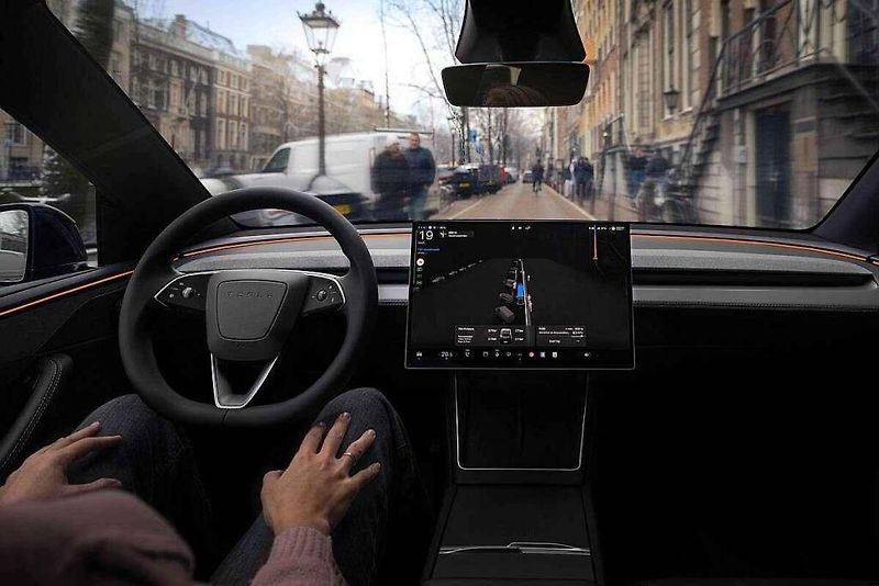 Tesla FSD.