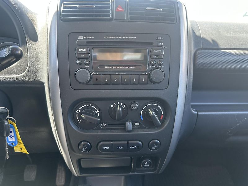 Suzuki Jimny (2006) 1.3i 63KW KLIMA  - fotka 16 z 18