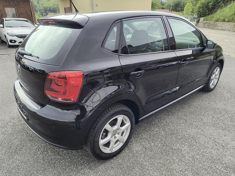 Volkswagen Polo (2009) 1.4 63KW/AC/PDC/ALU/VYHŘ.SEDAD - fotka 9 z 42