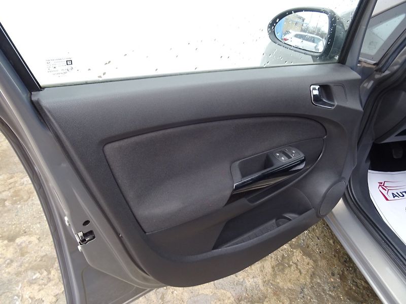 Opel Corsa (2014) 1.2i,63kW,1majČR,S.kniha,klima - fotka 16 z 21
