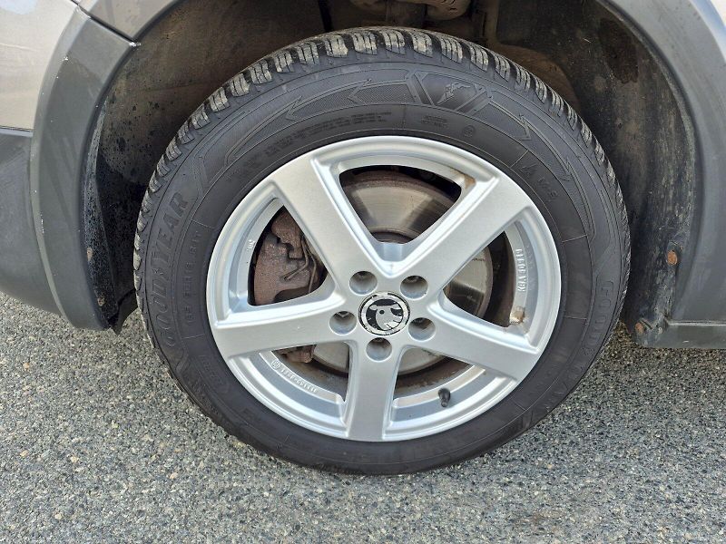 Škoda Roomster (2012) Scout 1.6 TDI 66 kW - fotka 23 z 23