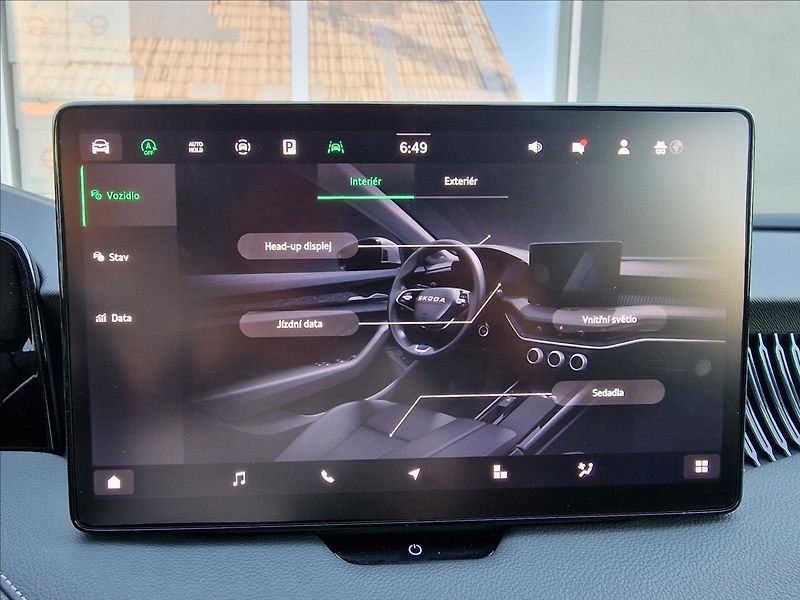 Škoda Superb 1.5 TSI DSG 110kW L&K Combi - fotka 33 z 50