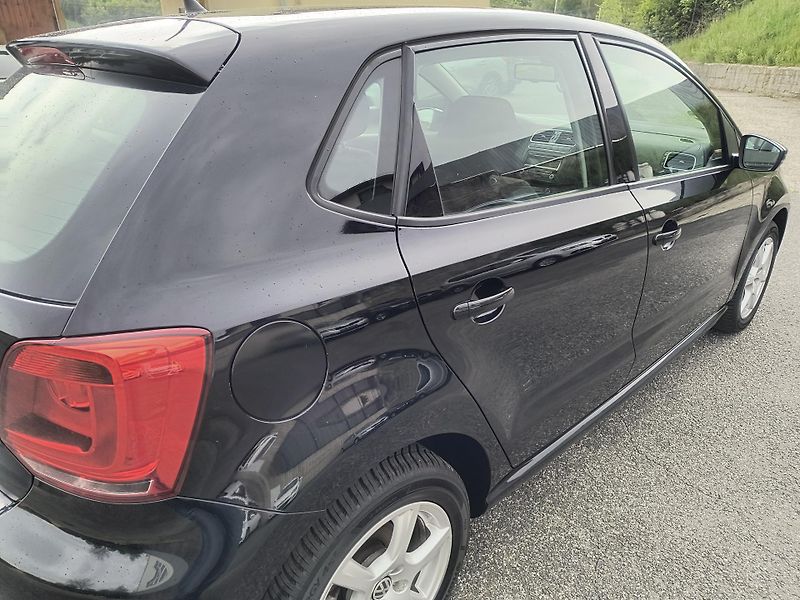 Volkswagen Polo (2009) 1.4 63KW/AC/PDC/ALU/VYHŘ.SEDAD - fotka 11 z 42