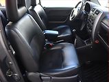 Suzuki Jimny (2006) 1.3 16V, 4X4, Vyhř. sedaček - náhled 9